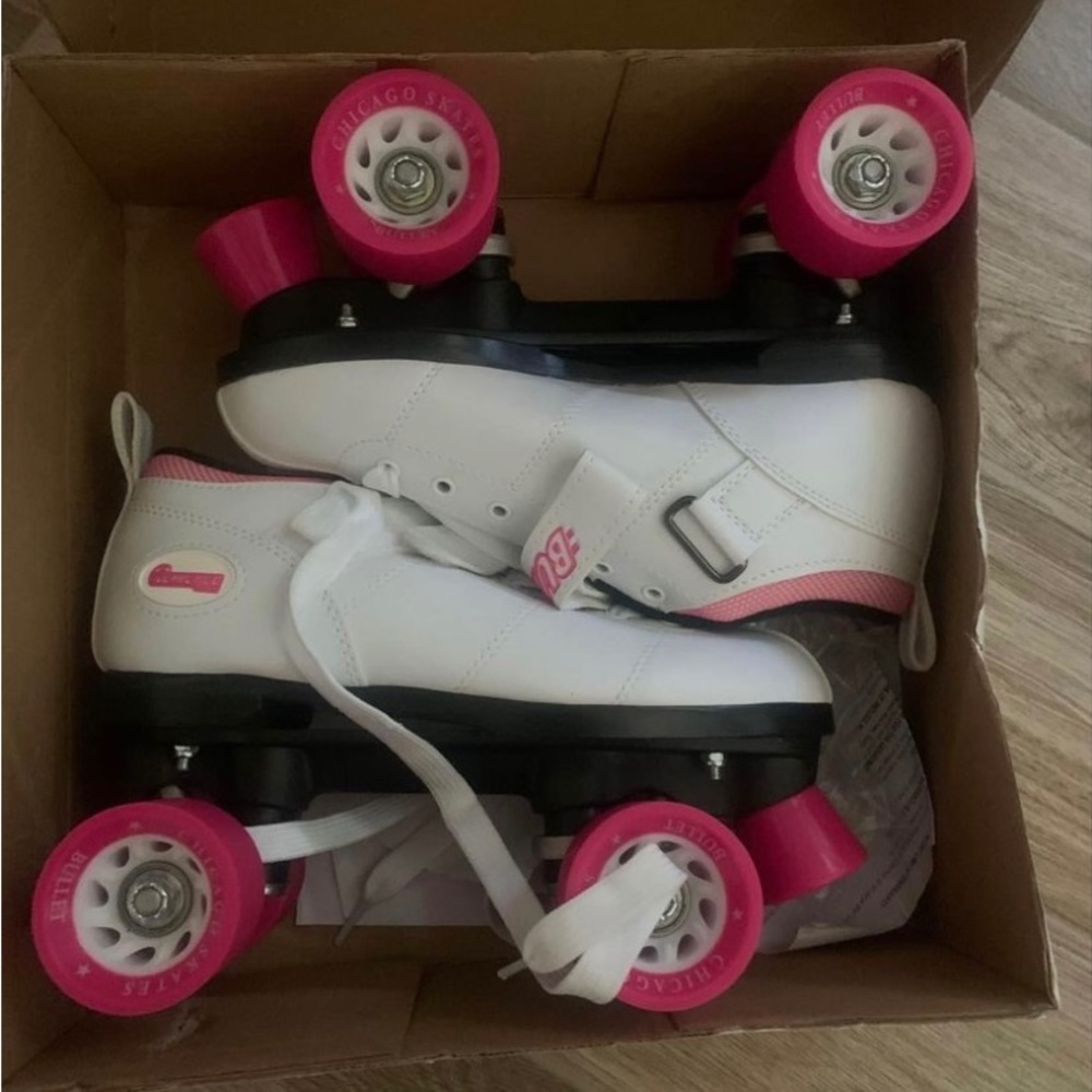 White and pink brand new roller skates